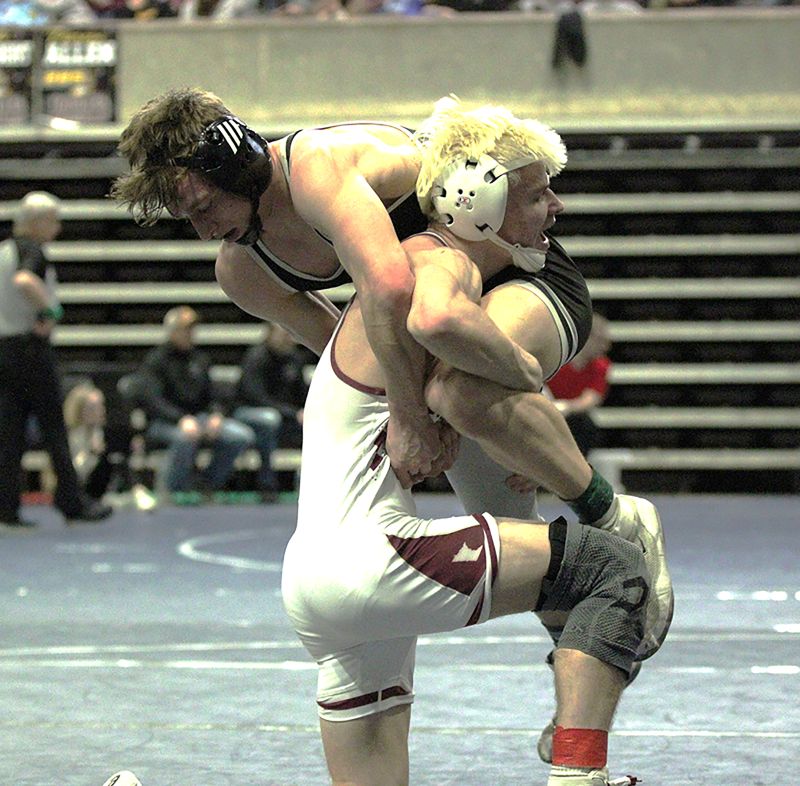 Chatfield’s Layne Root has LARP’s Owen Lange in a bit of a tough spot in their 139-pound section final match. But Lange controlled the match, winning by 13-7 decision. Each qualified for state. Photo by Paul Trende