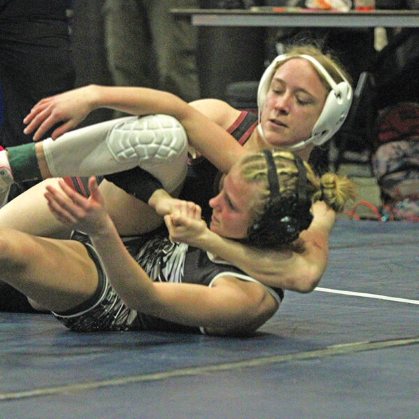 Chatfield senior Emily Bova has LARP’s Payson Speltz cradled in a Section 1 106-pound wrestle-back match. Bova notched four pins including above to make state as the runner-up in her weight class. Photo by Paul Trende