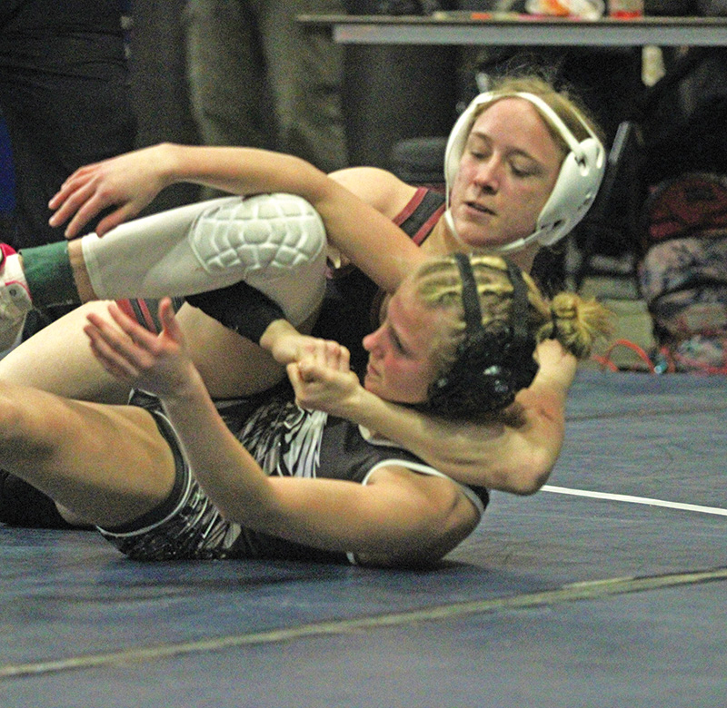 Chatfield senior Emily Bova has LARP’s Payson Speltz cradled in a Section 1 106-pound wrestle-back match. Bova notched four pins including above to make state as the runner-up in her weight class. Photo by Paul Trende
