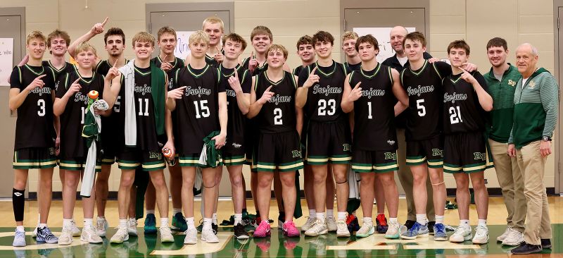 The 2025-2026 TRC-East boys basketball champions are Chris Drinkall’s Rushford-Peterson Trojans. R-P (12-2, 23-3) posted league wins over FC 70-50 and Cotter/HL 90-55 to finish their grab of the crown. It is R-P’s first conference title since the 2014-2015 state title season. Photo by Craig Johnson