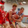 Mabel-Canton’s Nolan Garness battles Houston’s Tilden Witt for a loose ball in the Cougars’ 70-49 win. M-C wrapped up the season with a pair of wins (the other over SEC-East champ Lanesboro). Russ Larson’s group is 18-8 and the win total is the most in Mabel since 1976-1977! Photo by Emma Geiwitz