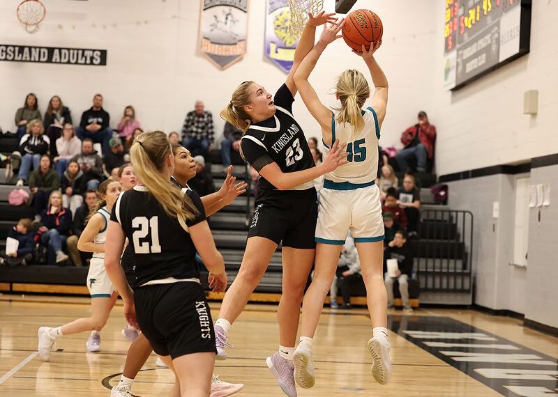 Kingsland’s Hailee Warren looks to block the shot of Fillmore Central’s Hannah Vaalemoen in the Falcons’ 60-28 non-conference win over the Knights. Photo by Christine Vreeman