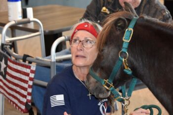 The residents are looking forward to a return visit from Cindy Forrer and Baron the Brave in 2026. Photo by Charlene Corson Selbee