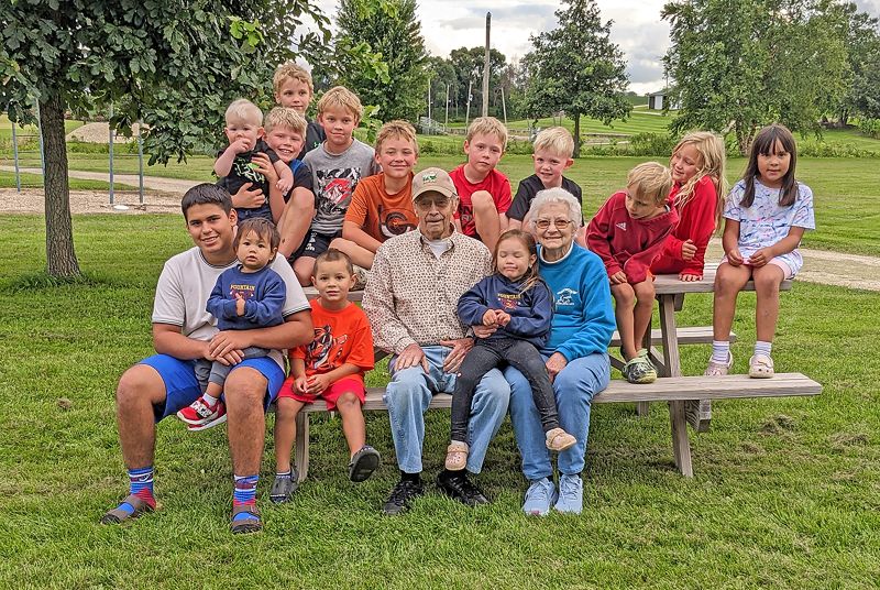 Bud and Ellen Aasum are surrounded by their great-grandchildren. The couple has 18 great-great-grandchildren and two more on the way. They proudly noted that one lives in Cedar Rapids but the rest all live within 25 miles of them. Photo submitted