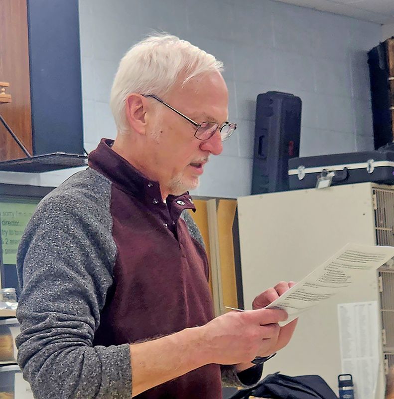 Gerald Wolf addresses attendees during the Republican precinct caucus Tuesday evening at Kingsland School as the group conducted caucus business and organizational proceedings. Photo by Zech Sindt
