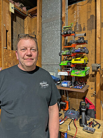 Chris Musty owns nine cars he uses for RC racing. He says they all run about the same speed. Photo by Jason Sethre