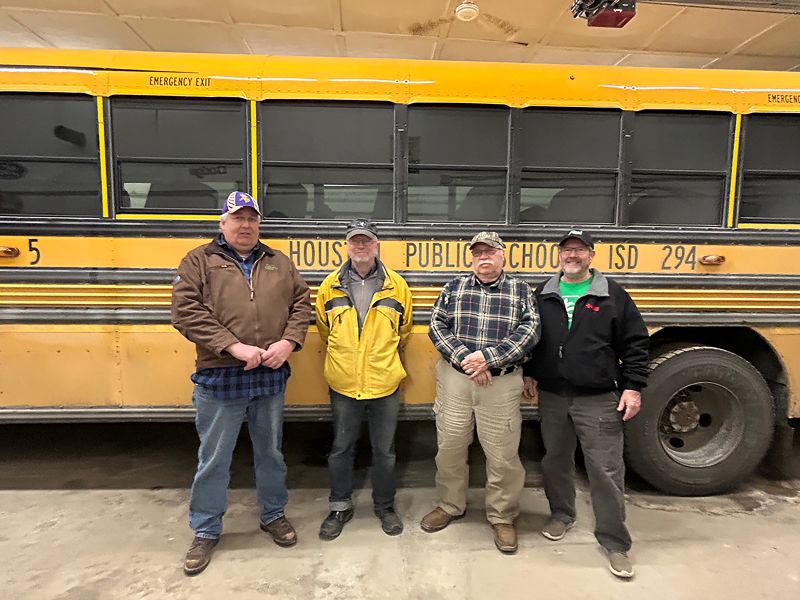 Four of the Houston Bus Drivers, from left to right: John Beckman, John Carlson, Roy Loken and Doug Jore. Longtime driver Ron Belongie was at an appointment and is not pictured. Photo by Wanda Hanson