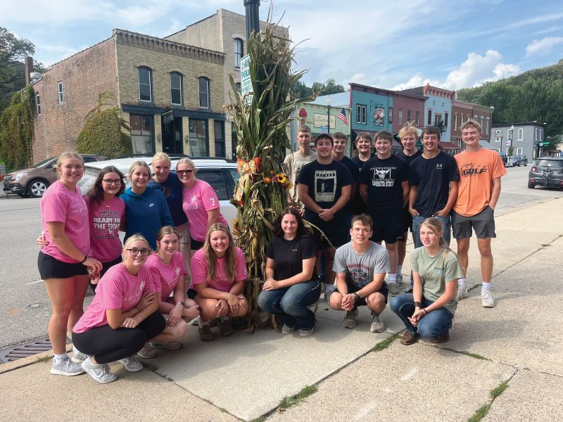 Members decorated the town with corn stalks for the fall season in Lanesboro.
