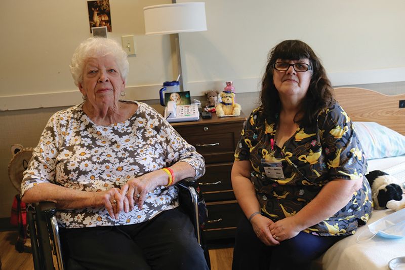 Chosen Valley Care Center employee Angela Moss and resident Diane Lange share a laugh together. Photo by Barb Jeffers
