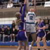 Fillmore Central’s Norah Nagel attacks the hoop late over Southland’s Avery Stroup in a 1A quarterfinal. FC built a 27-7 first half lead but fell 73-65. Photo by Paul Trende