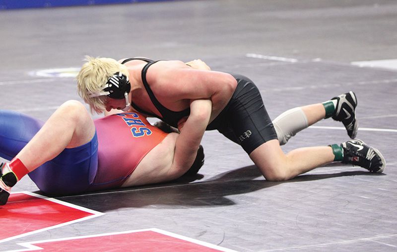 LARP’s Chace Drazkowski (34-10) ends his state experience pinning Canby’s Jordan DePestel, avenging a Round of 16 state loss. The win gave Drazkowski fifth place at 285-pounds. Photo by Paul Trende