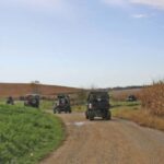 Members of the Bluff Country ATV Club ride along a rural gravel road near Chatfield, passing farmland during one of the group’s organized trail rides. Photo submitted