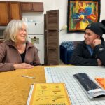 Bonnie Gibson and Roberto chat at the opening reception. Photo by Wanda Hanson