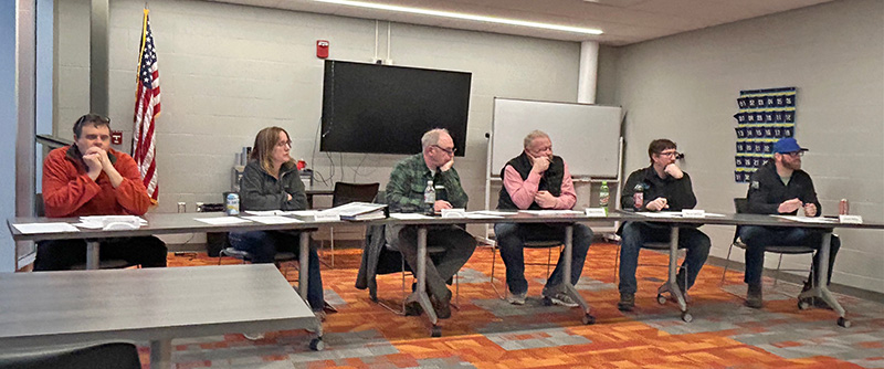 The Lanesboro School Board listens to Superintendent Matt Schultz as he shares the recent policy committee meeting discussion about semester tests. From left to right: Steve Storhoff, Sarah Peterson, Chair Steve Snyder, Mark Holmen, Kevin Horihan and Lucas Bergo. Photo by Wanda Hanson