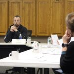 Rushford Mayor Leigh Volkman, left, listens to new City Clerk Tiffany Jacobson at the March 9 meeting. Photo by Kirsten Zoellner