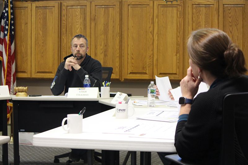 Rushford Mayor Leigh Volkman, left, listens to new City Clerk Tiffany Jacobson at the March 9 meeting. Photo by Kirsten Zoellner