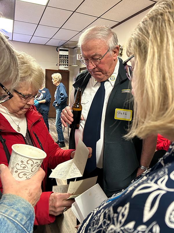 Donna Aarsvold reads from the last letter Wes wrote to her husband and her. Photo by Wanda Hanson