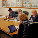 Members of the Wykoff City Council discuss city business during their March 9 meeting. Topics included wastewater infrastructure planning, park improvements, and new parking restrictions along portions of North Gold Street and Fillmore Street West. Photo by Zech Sindt