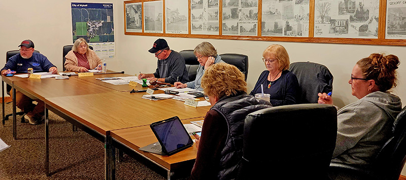 Members of the Wykoff City Council discuss city business during their March 9 meeting. Topics included wastewater infrastructure planning, park improvements, and new parking restrictions along portions of North Gold Street and Fillmore Street West. Photo by Zech Sindt