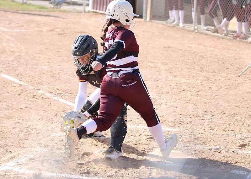 Chatfield’s Rylee Urban gets to home plate just ahead of the throw to Dover-Eyota catcher Nora Hansen. It was the game’s first run, as the Gophers built a 5-0 lead. They held on by a 5-4 final, recording the final out via a strike-three fouled-bunt attempt (with an Eagle runner on third). Photo by Paul Trende