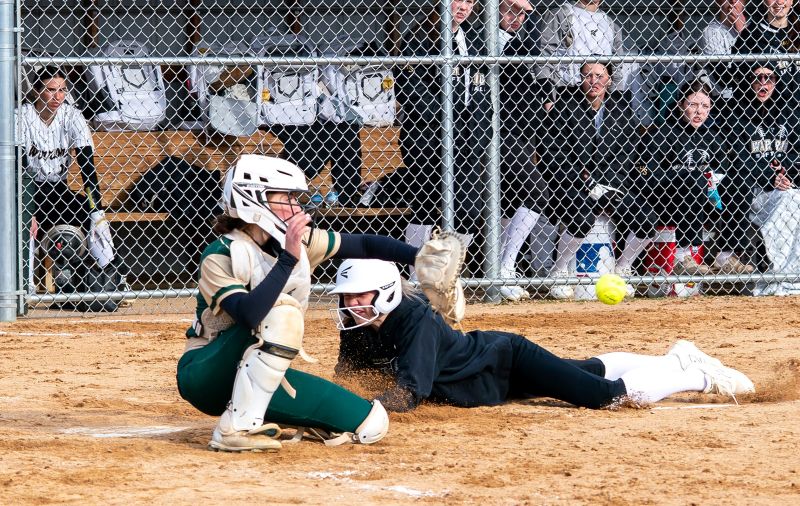 Caledonia’s Elsa Blum slides in safely to home ahead of the throw to Rushford-Peterson’s Ariana Bettinger in the Warriors’ 21-0 TRC win. Team Cal, ranked #7 in AA, went 3-1 on the week including topping #4 in AAA Byron 2-1 and #3 in AA Dilworth-Glyndon-Felton 5-4. Photo by Dawn Hauge