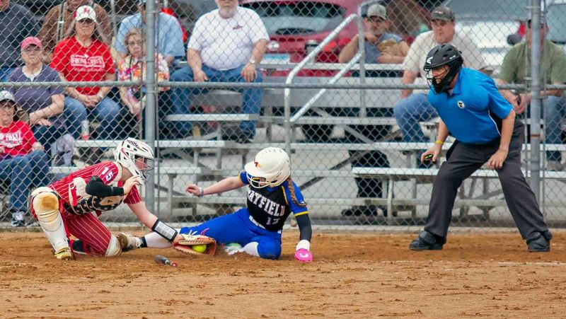 Hurricane catcher Kayla Klunder applies the tag to Hayfield’s Emma Bamlet in the team’s non-conference game in Houston. Bamlet scored, but it was the Vikings only run, as a dominating team double-H (ranked #3 in Class A) improved to 8-0 with a 13-1 win. Photo by Emma Geiwitz