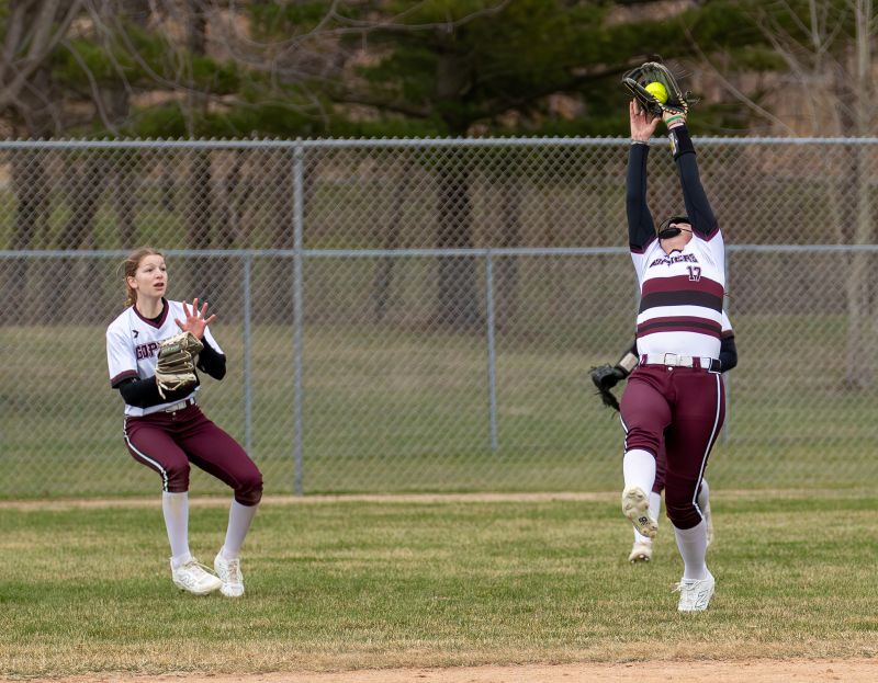 Kendyl Nolte goes backward to make a nice catch in Chatfield’s 9-4 win over Cotter/Hope Lutheran in eight innings, where the above had three-run double in the final frame. Gopher Ali Eickhoff is also shown. Photo by Leif Erickson