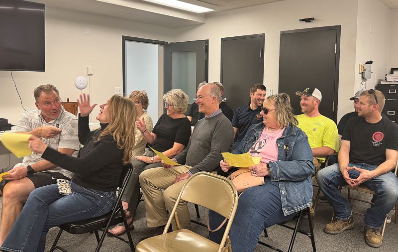 Attendees at the April 13 Caledonia City Council meeting were enjoying themselves before the meeting was called to order. Photo by Charlene Corson Selbee