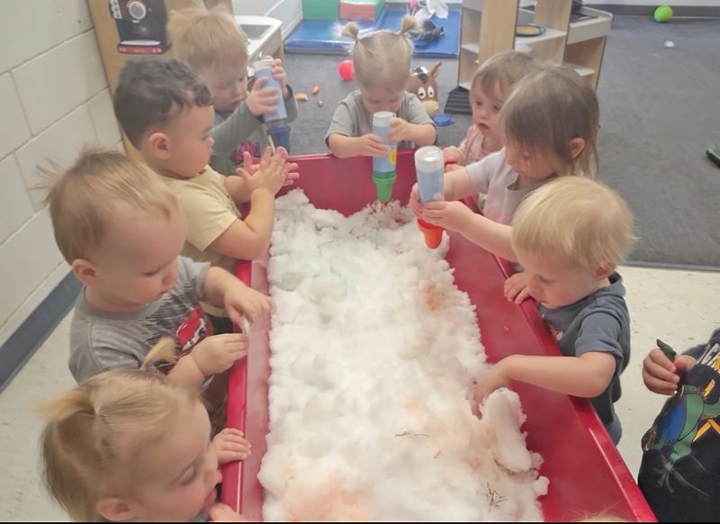 Playing with snow in the sensory table. Photo submitted