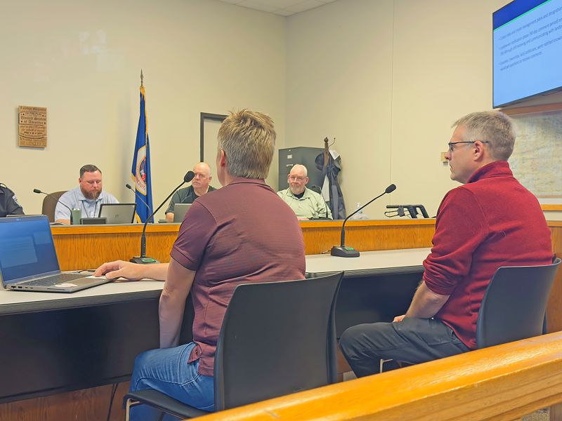 Melissa Wagner, Lanesboro Area Fisheries Supervisor, and Dean Paron, DNR Stream Habitat Supervisor updated the Houston County Commissioners on the current trout stream designation project at their April 21 commission meeting. Photo by Charlene Corson Selbee