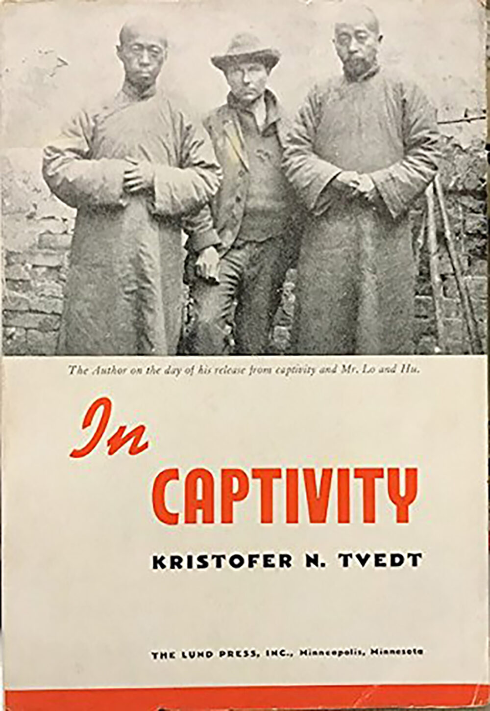 Kristofer Tvedt, following his release from the Chinese communists, compiled his experiences into the book “In Captivity.” The front cover pictures him on the day of his release with two Chinese men.Photo submitted