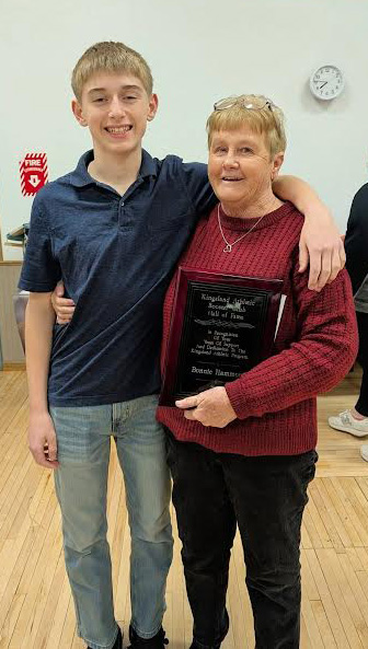 Bonnie Hammon, pictured alongside her great-grandson Payton Kaase, was inducted into the Kingsland Booster Club Hall of Fame for her 40 years of volunteering. Photo submitted