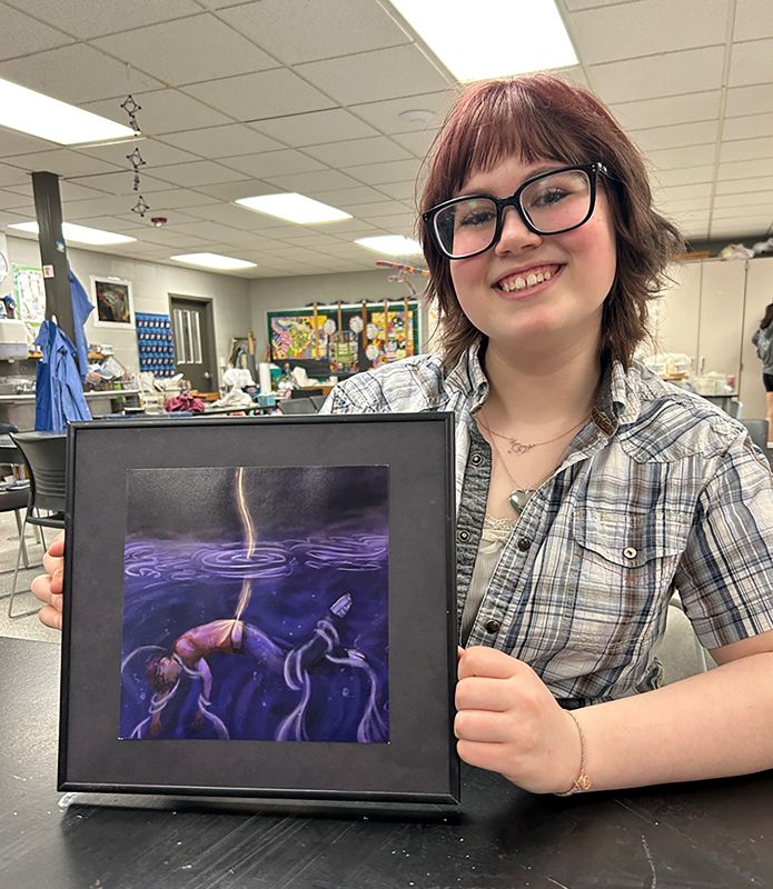 Sawyer Lepper with her digital work inspired by Percy Jackson.