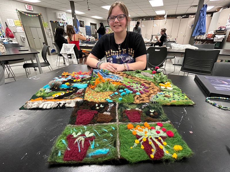 Evelyn Lobland’s colorful felting pieces.