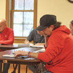The Peterson Council at the April 8 meeting, clockwise from left: Mayor Chris Stenzel and Coucilors Tracy Seelbinder, Kristina Grindland, and Justin Simon. Absent from the meeting was Councilor Gail Boyum. Photo by Kirsten Zoellner