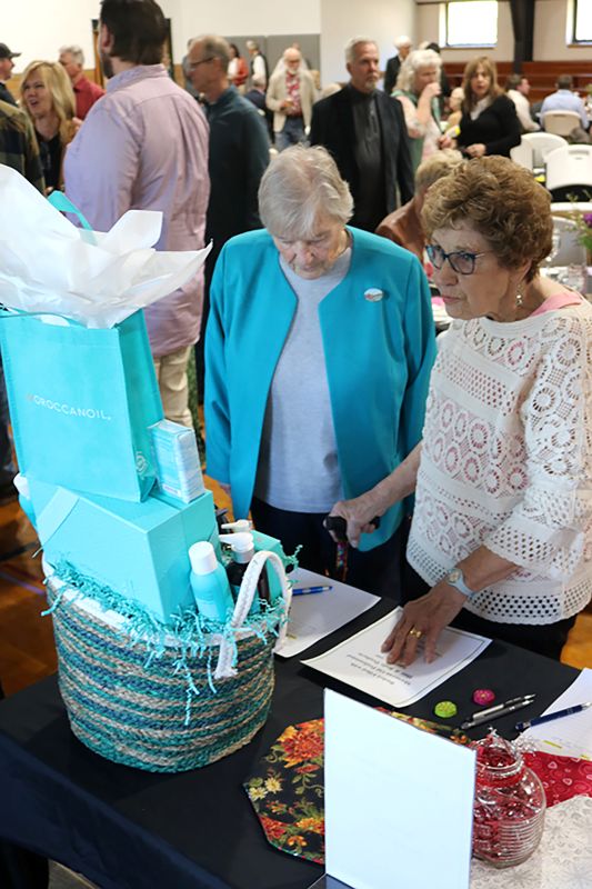There were a wide variety of silent auction items to bid on during the LACF Annual Banquet 2026. Photo by Barb Jeffers