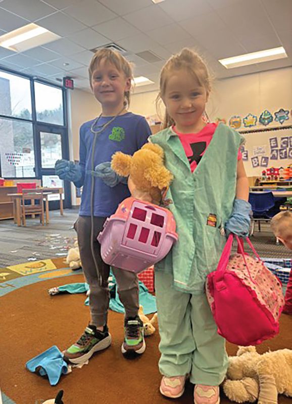 Preschoolers Jackson and Ziva dressing up as veterinarians. Photo submitted