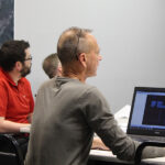 Rushford City Administrator Hayden Stensgard, left, listens as Public Works Director Roger Knutson details goals for 2026. Photo by Kirsten Zoellner