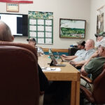 The Rushford Village Council listens in at the April 21 meeting. Pictured clockwise from left are Councilor Bob Hart, Zoning Administrator Jon Pettit, Councilor Travis Link, Mayor Dennis Overland, and Councilors Rick Ruberg and Mike Ebner. Photo by Kirsten Zoellner