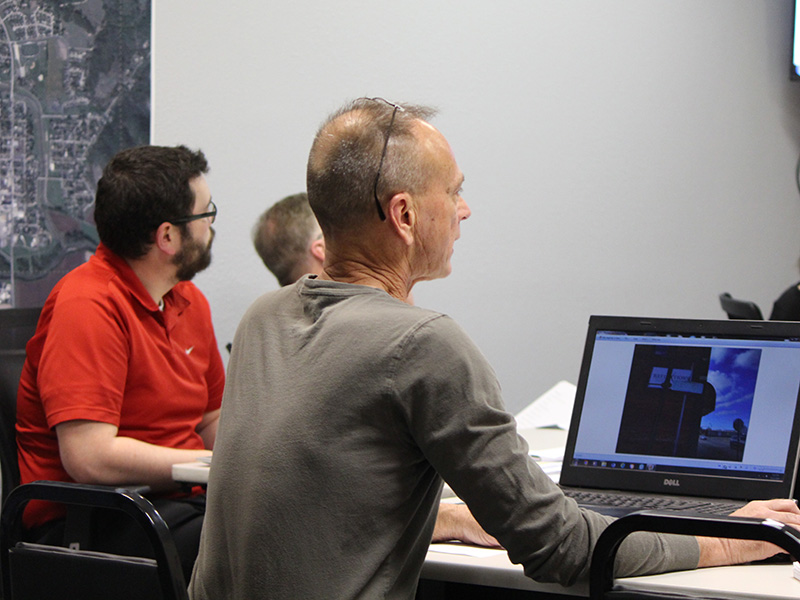 Rushford City Administrator Hayden Stensgard, left, listens as Public Works Director Roger Knutson details goals for 2026. Photo by Kirsten Zoellner