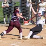 Caledonia’s Nora Staggemeyer and Chatfield’s Rylee Urban will collide at home plate with Staggemeyer out in the team’s TRC matchup. But the Warriors beat the Gophers 6-1, Cotter twice, 5-4 and 7-1, and Stewartville 10-1, as #7 in Class AA Caledonia improved to 11-1 on the year. Photo by Leif Erickson