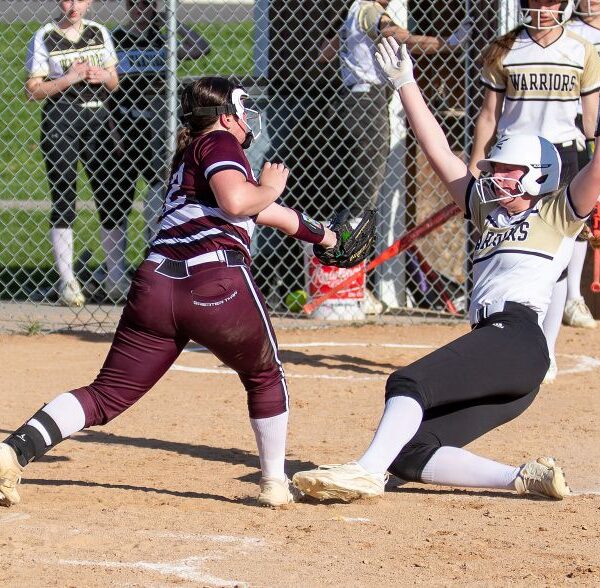 Caledonia’s Nora Staggemeyer and Chatfield’s Rylee Urban will collide at home plate with Staggemeyer out in the team’s TRC matchup. But the Warriors beat the Gophers 6-1, Cotter twice, 5-4 and 7-1, and Stewartville 10-1, as #7 in Class AA Caledonia improved to 11-1 on the year. Photo by Leif Erickson