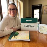 Leader Becky Stocker shares some of the GriefShare materials that help her prepare to lead the group. Photo by Wanda Hanson