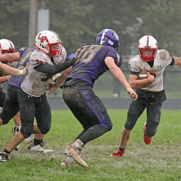 Football: Cardinals Slip Past Rival Superlarks